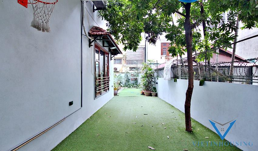 Nice three bedroom house with big yard for rent on Dang Thai Mai
