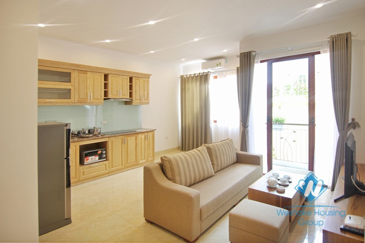 Lovely 01 bedroom apartment with small balcony for rent in To Ngoc Van street