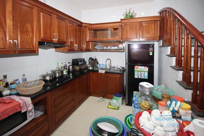 Good quality house with natural wooden furniture for rent in Ba Dinh