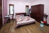Good quality house with natural wooden furniture for rent in Ba Dinh