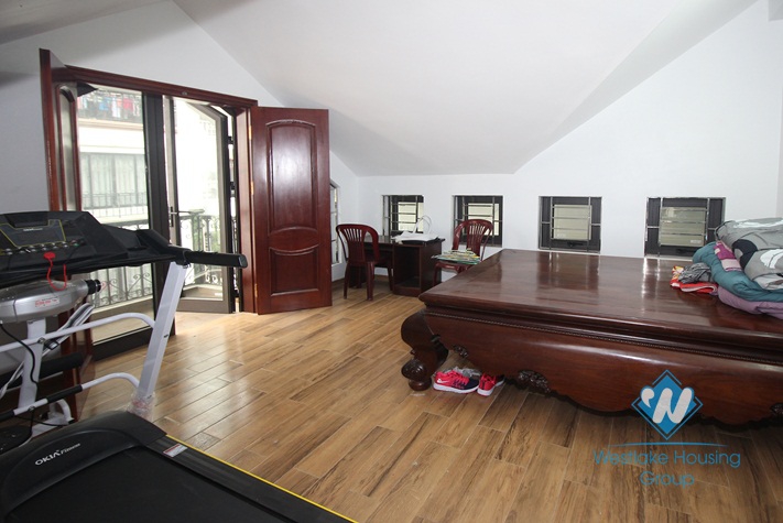 Good quality house with natural wooden furniture for rent in Ba Dinh