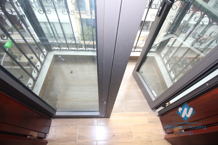 Good quality house with natural wooden furniture for rent in Ba Dinh