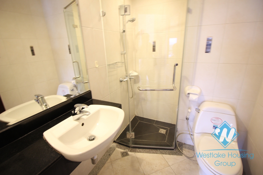 Two bedroom apartment for rent located in a service building in the center of Hoan Kiem district, Hanoi, Vietnam