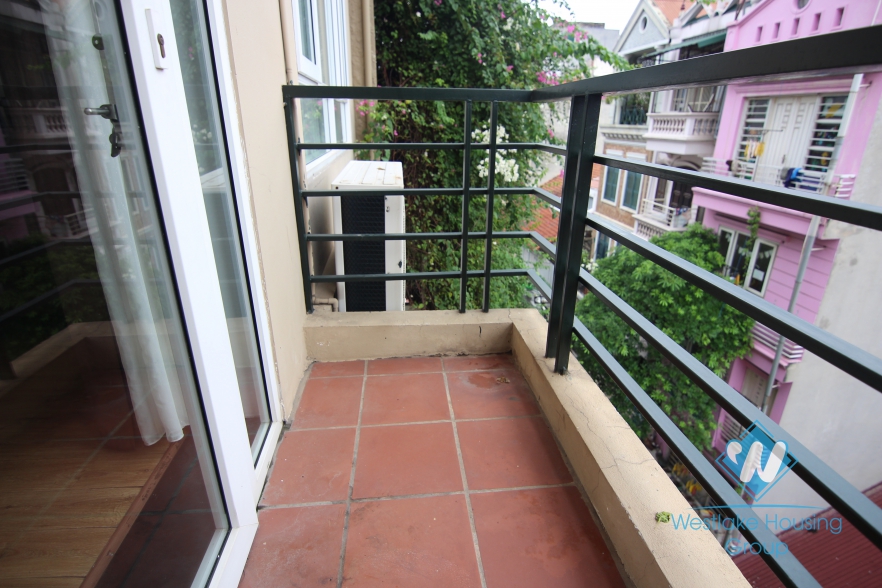 Small balcony furrnished 2 bedrooms apartment for rent in Hai Ba Trung district