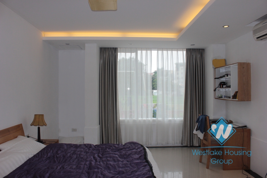 Beautiful apartment with nice garden for rent in Xuan Dieu Street, Tay Ho, Ha Noi 