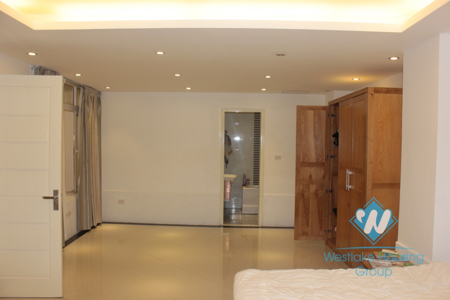 Beautiful apartment with nice garden for rent in Xuan Dieu Street, Tay Ho, Ha Noi 