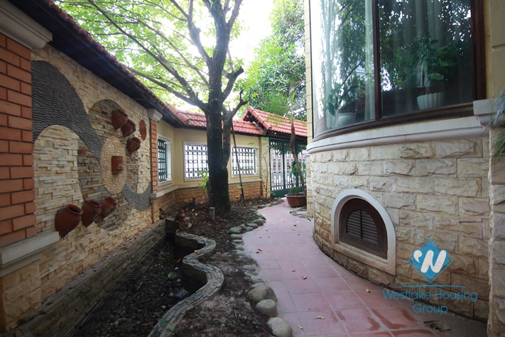 A 600 sqm villa with garden yard and terrace available for rent in Tay Ho