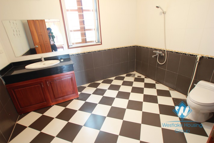 Beautiful house with big courtyard and swimming pool for rent in Xuan Dieu Street, Tay Ho District, Ha Noi