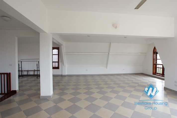 Beautiful house with big courtyard and swimming pool for rent in Xuan Dieu Street, Tay Ho District, Ha Noi