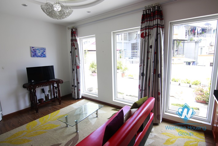 Bright and Fully Furnished One Bedrooms Apartment for rent in Doi Can st, Ba Dinh district.