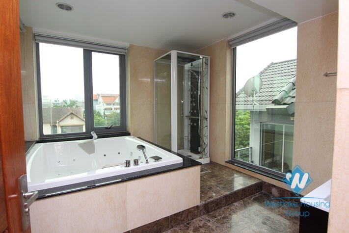 5 storey modern Tay Ho villa for rent with a car garage and elevator