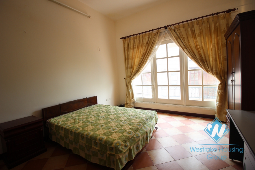 Nice house with 4 bedrooms and car parking space for rent in Ba Dinh