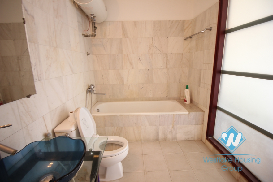 Nice house with 4 bedrooms and car parking space for rent in Ba Dinh