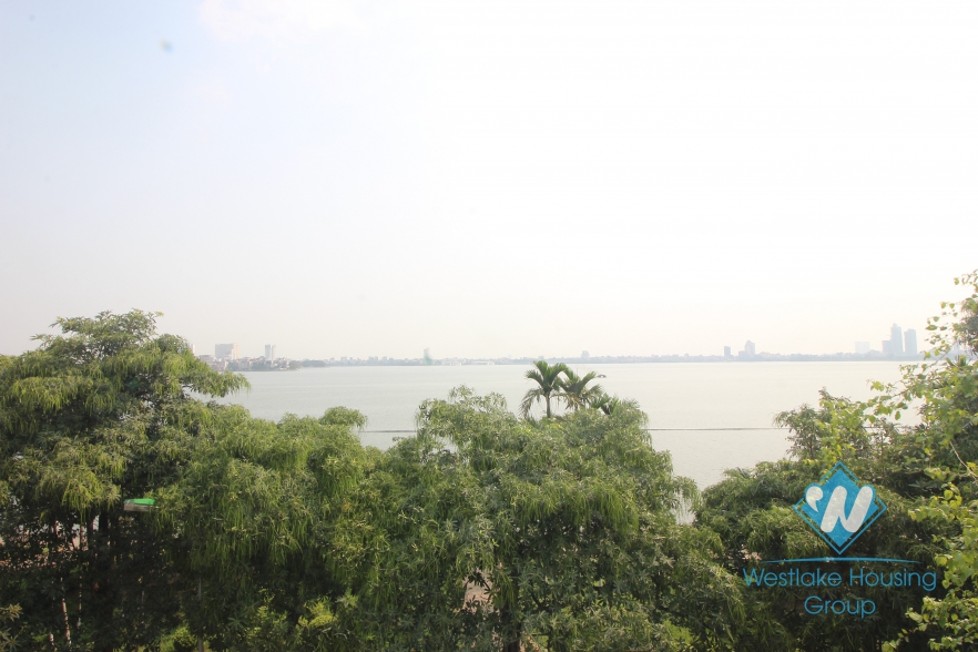 Charming villa for rent on the lakeside with lovely garden in Tay Ho, Hanoi