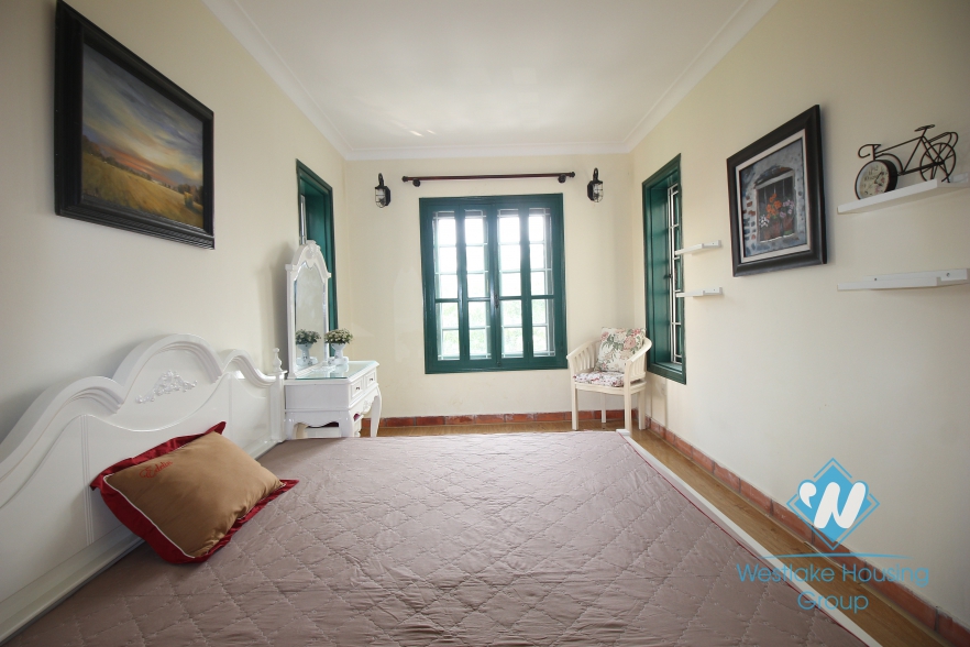Charming villa for rent on the lakeside with lovely garden in Tay Ho, Hanoi