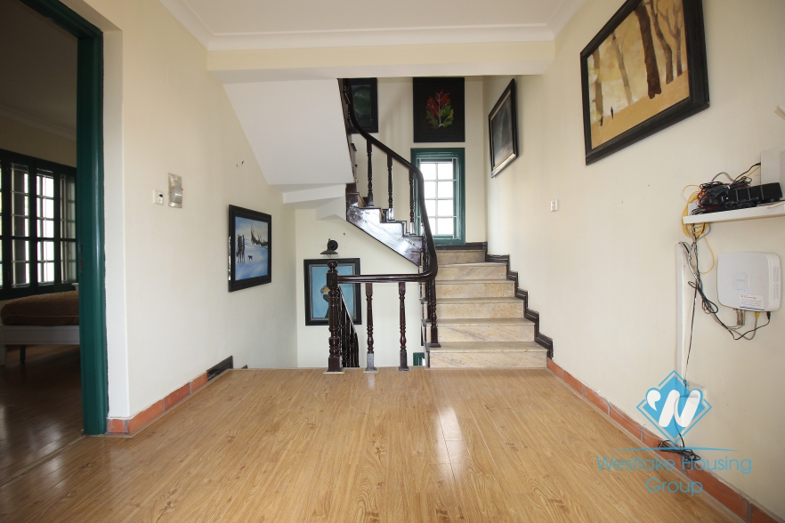 Charming villa for rent on the lakeside with lovely garden in Tay Ho, Hanoi