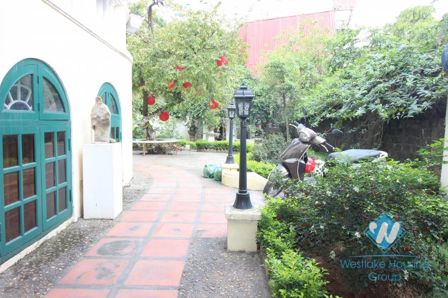 Charming villa for rent on the lakeside with lovely garden in Tay Ho, Hanoi