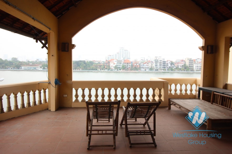 Charming house with nice yard for rent in Tay Ho area.