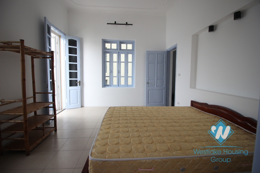 Charming house with nice yard for rent in Tay Ho area.