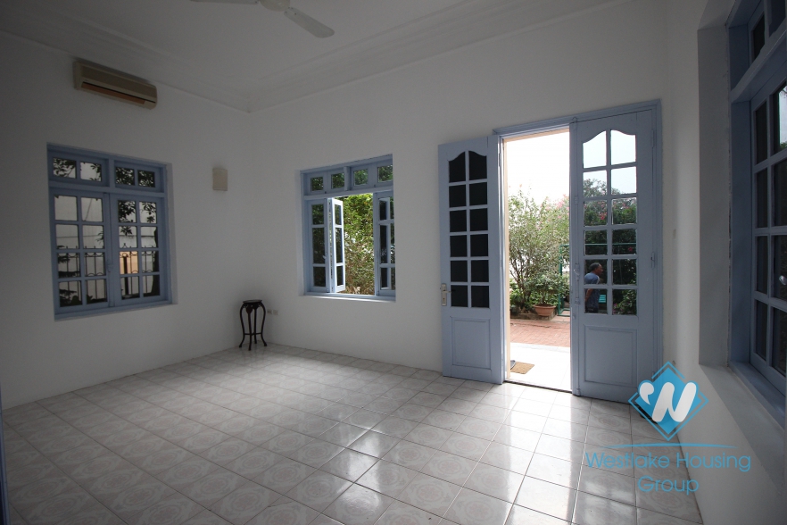 Charming house with nice yard for rent in Tay Ho area.