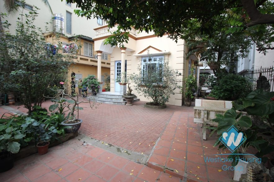 Charming house with nice yard for rent in Tay Ho area.