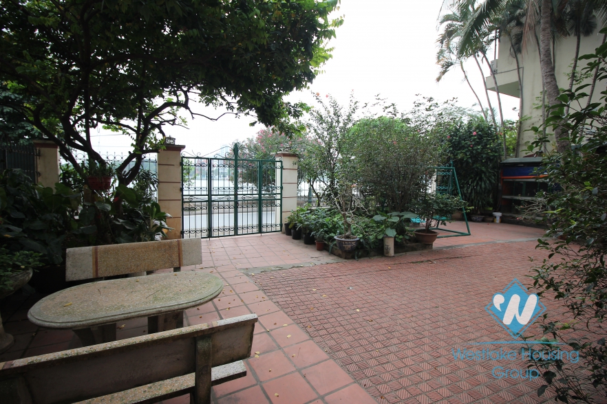 Charming house with nice yard for rent in Tay Ho area.