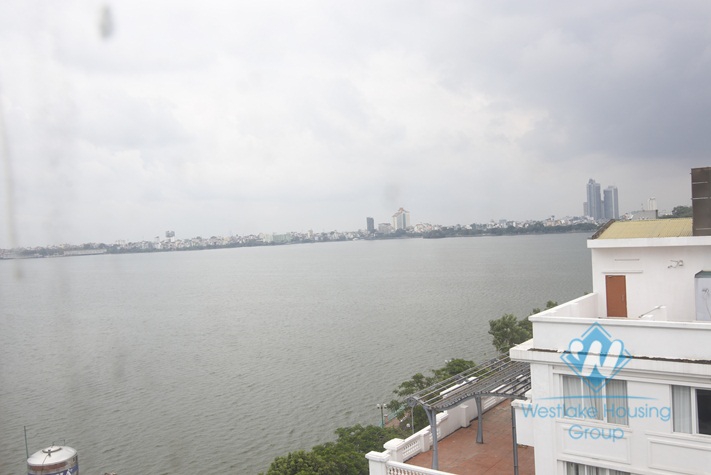 Cheap price 4 bedrooms apartment for rent near Thuy Khue street, Hanoi.