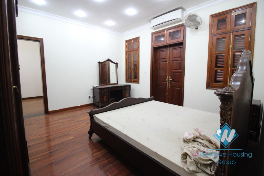 Unfurnished house with wooden floor for rent in Ciputra, Tay Ho, Hanoi.