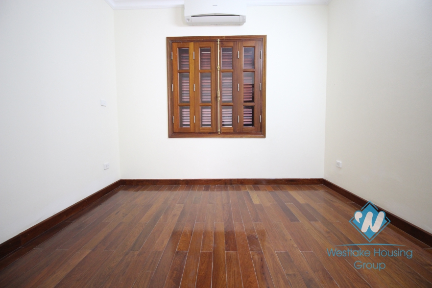 Unfurnished house with wooden floor for rent in Ciputra, Tay Ho, Hanoi.