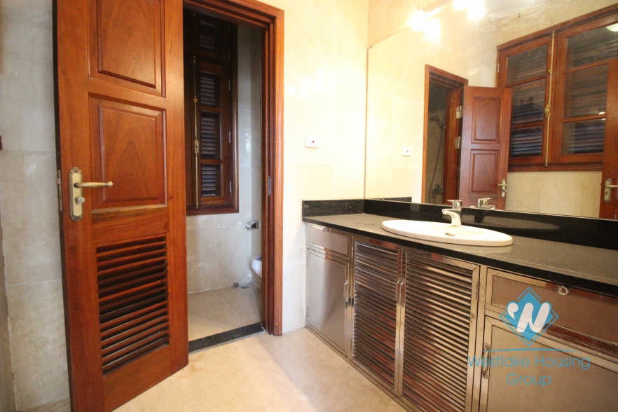 Unfurnished house with wooden floor for rent in Ciputra, Tay Ho, Hanoi.