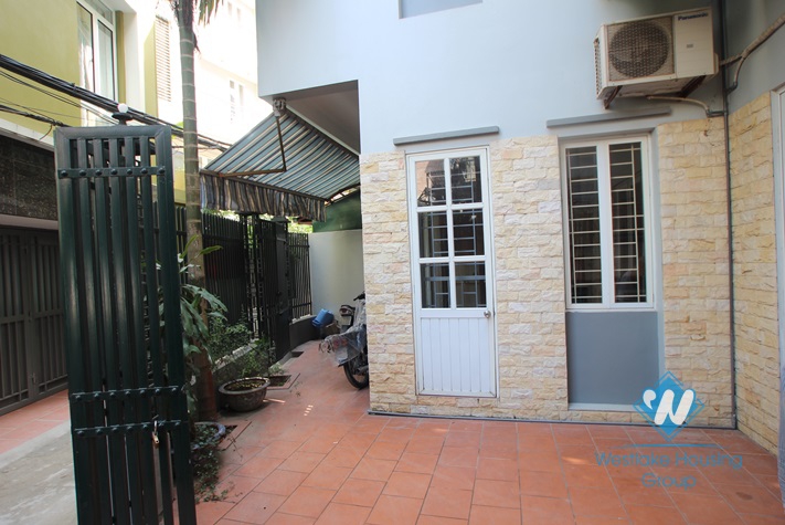 4-floor house with nice yard for rent in Tay Ho district .