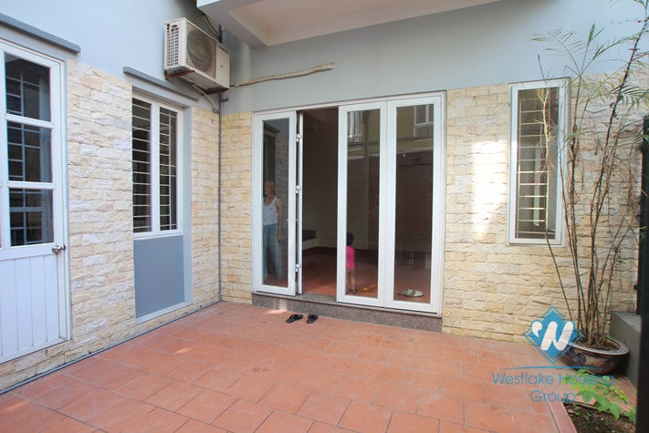 4-floor house with nice yard for rent in Tay Ho district .