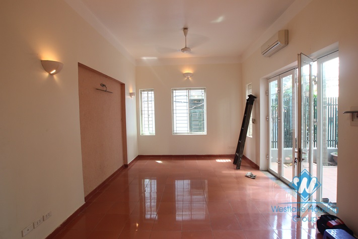 4-floor house with nice yard for rent in Tay Ho district .