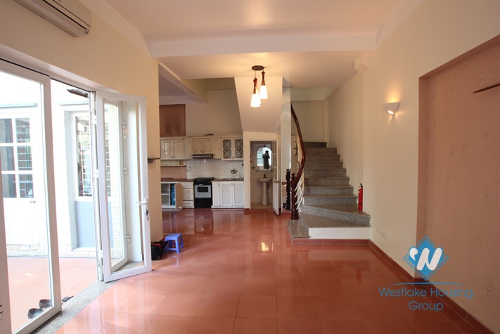 4-floor house with nice yard for rent in Tay Ho district .