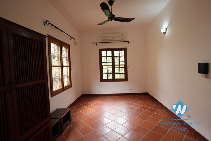 Beautiful house with big yard for rent in Tay Ho, Ha Noi.