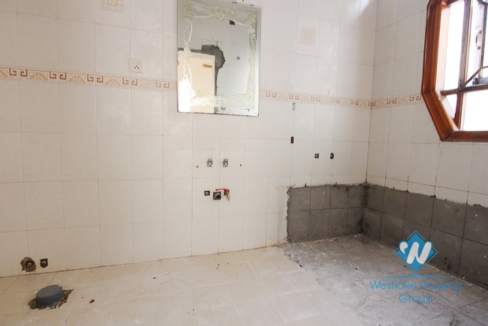 Unfurnished house for rent in Truc Bach area.