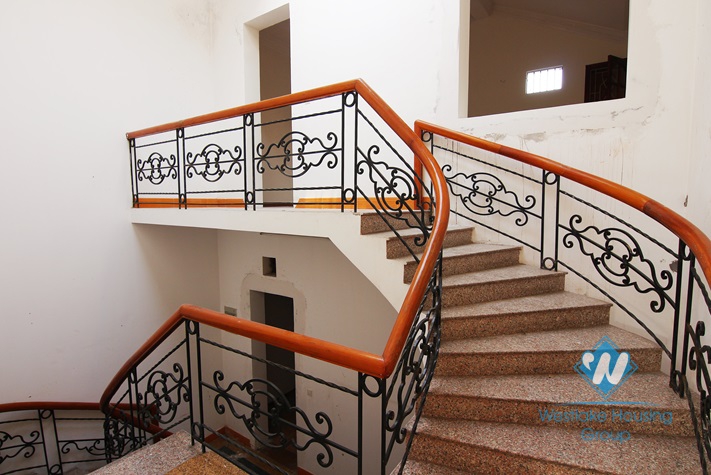 Unfurnished house for rent in Truc Bach area.