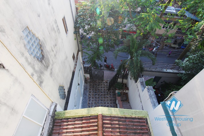 Unfurnished house for rent in Truc Bach area.