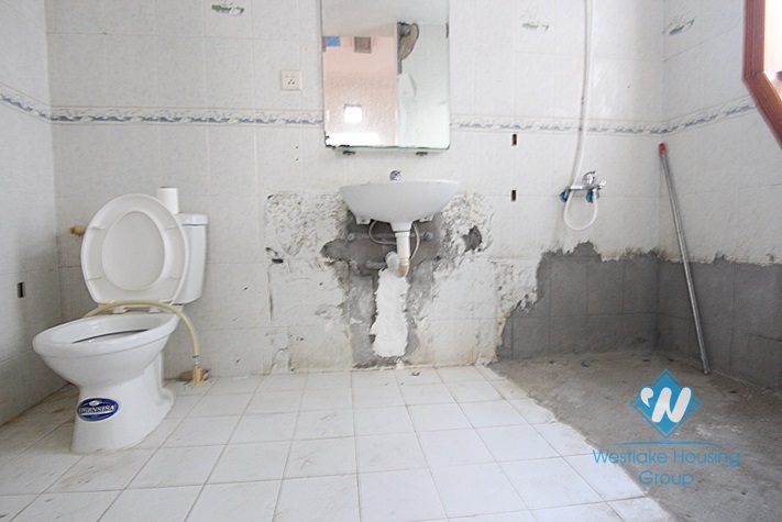 Unfurnished house for rent in Truc Bach area.