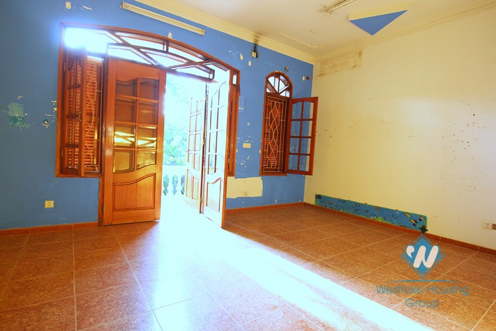 Unfurnished house for rent in Truc Bach area.