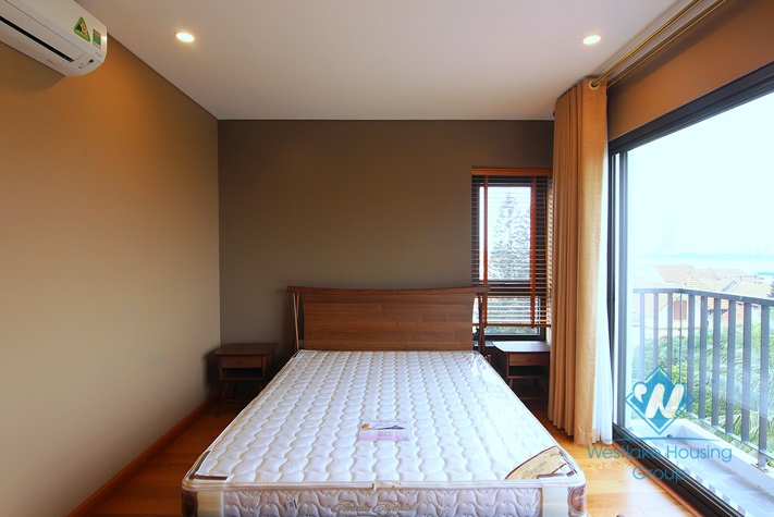 Bedroom with view to Westlake apartment for rent  in Tay Ho district.
