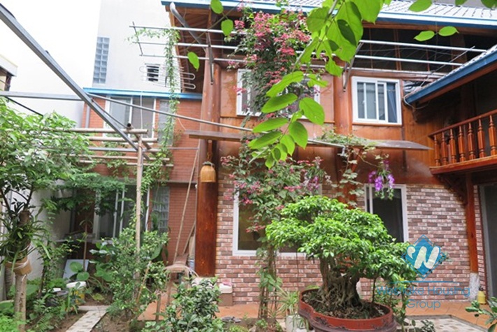 A unique- style house beautiful large garden for rent in Ba Dinh district