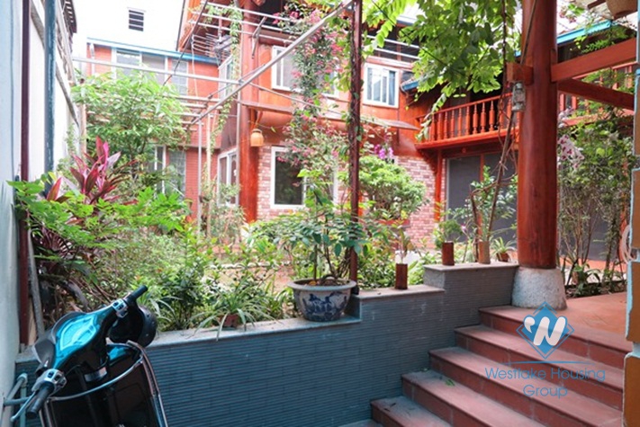 A unique- style house beautiful large garden for rent in Ba Dinh district