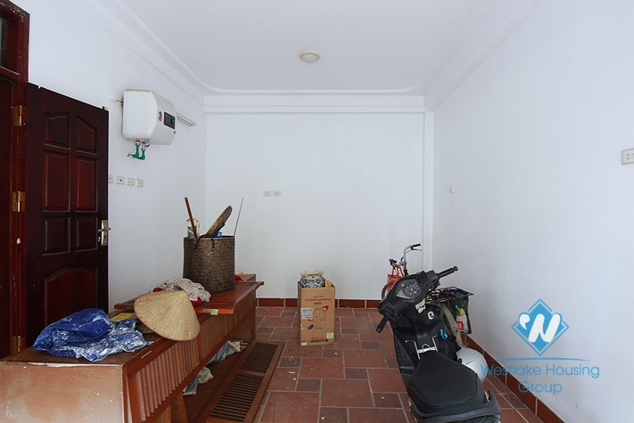 Unfurnished 4 bedrooms house with yard and garage for rent in Au Co st, Tay Ho area.