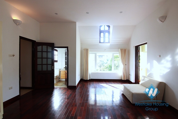 Unfurnished 4 bedrooms house with yard and garage for rent in Au Co st, Tay Ho area.
