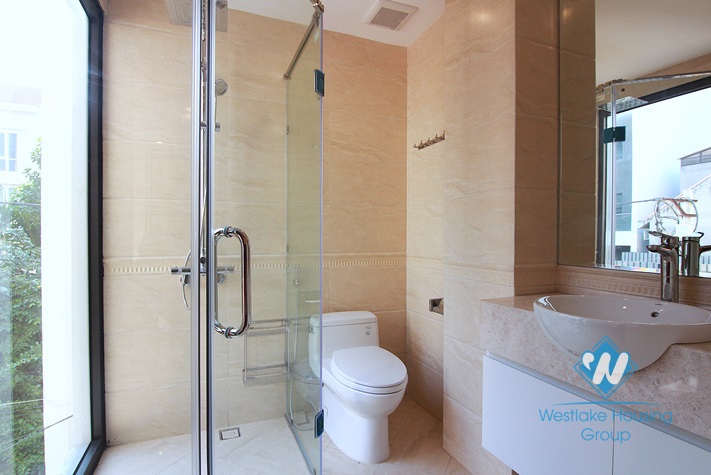 Bright and Morden 3 bedrooms apartment for rent close to Quang An street, Tay Ho district.