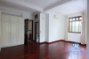 Unfurnished 4 bedrooms house with yard and garage for rent in Au Co st, Tay Ho area.