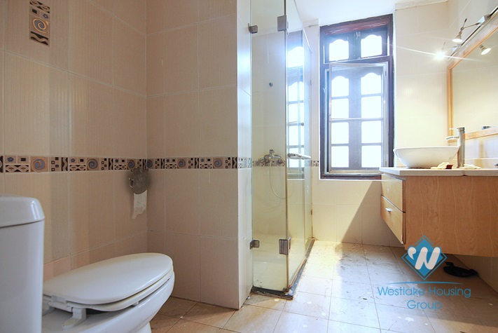 Unfurnished 4 bedrooms house with yard and garage for rent in Au Co st, Tay Ho area.