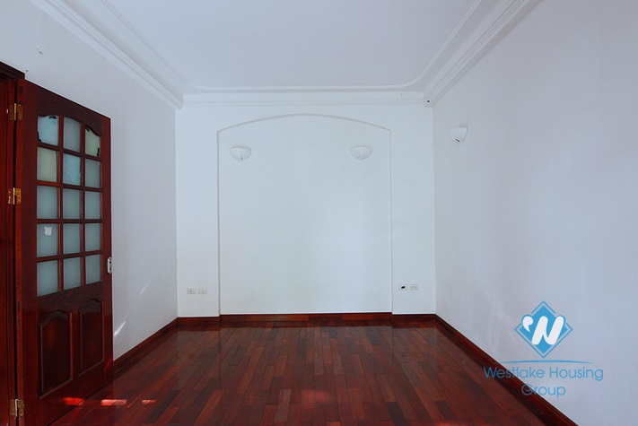 Unfurnished 4 bedrooms house with yard and garage for rent in Au Co st, Tay Ho area.