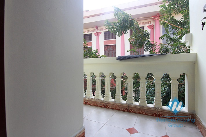 Unfurnished 4 bedrooms house with yard and garage for rent in Au Co st, Tay Ho area.